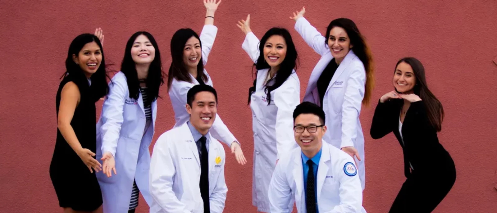 Our Team, doing jazz hands.